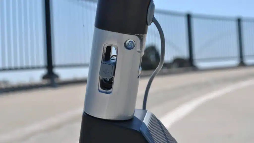 Unagi Scooters in 2026: Why the Classic and Voyager Are Still Smart Buys 2 Unagi Model One one-touch folding latch on the stem