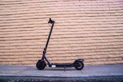 hiboy s2 in front of brick wall