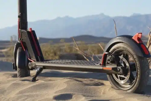 Gotrax GXL V2 on a sandy beach