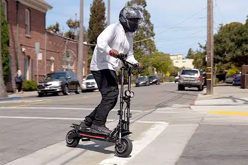 person riding wolf warrior x around a corner