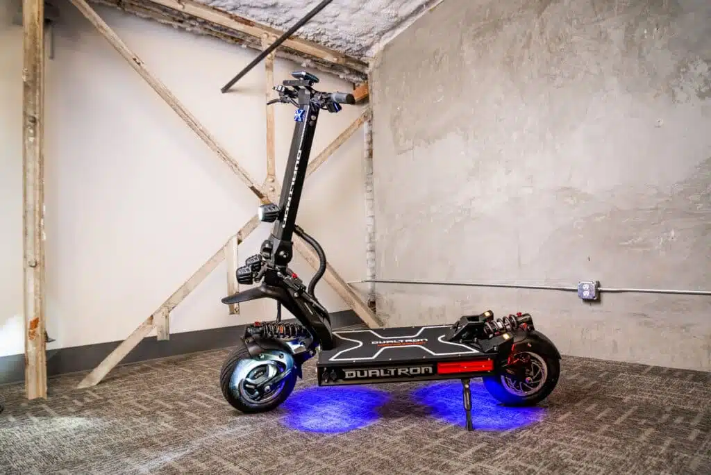 Dualtron X Limited infront of cement wall