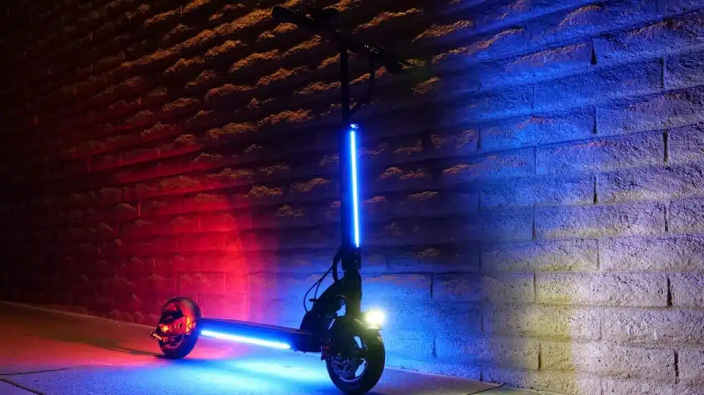 Electric Scooter at night with lights on