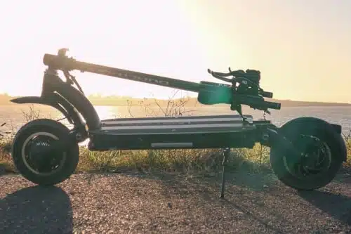 dualtron eagle pro electric scooter folded in front of sunset