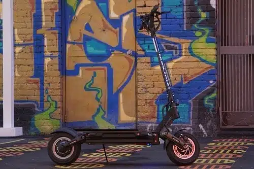 Dualtron Thunder in front of Graffitied Wall