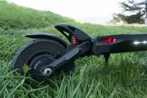 kaabo mantis pro electric scooter rear wheel in grass