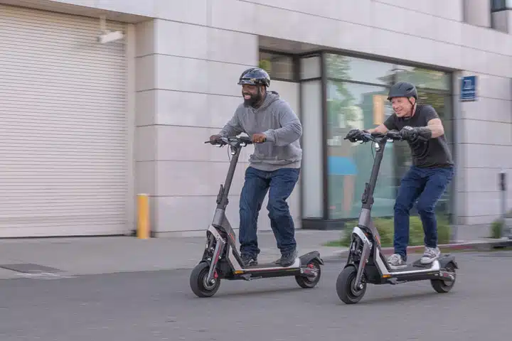 2 Segway GT1s ridden side by side