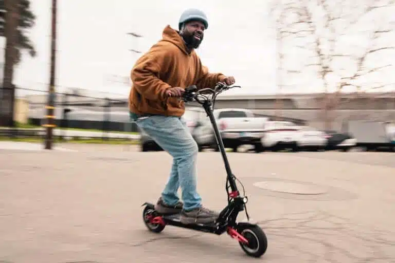 man riding Synergy Tsunami around a corner