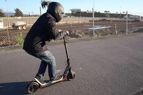 Uscooters Booster V ridden down the street