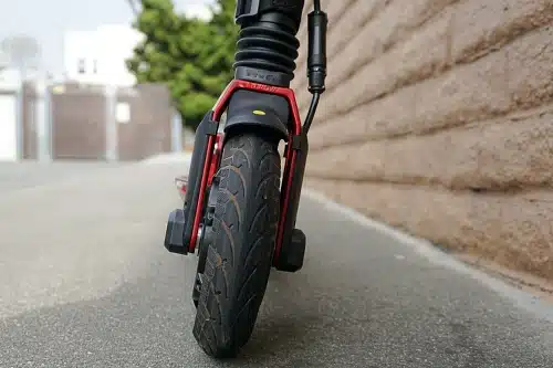 Red Uscooters Booster Sport front facing wheel