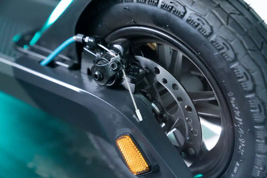 Gotrax G3 Plus rear tire large featuring brakes