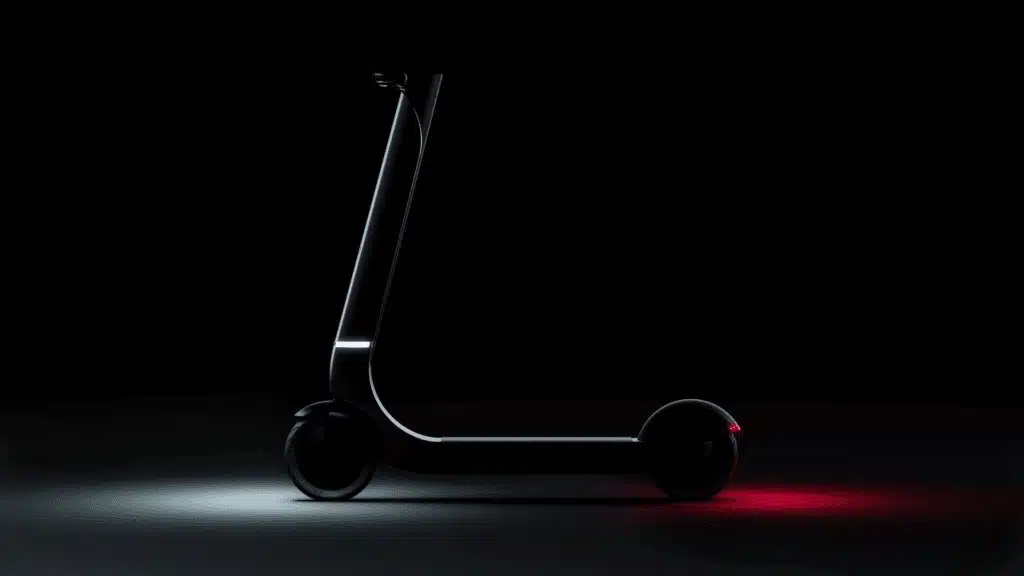 bo m electric scooter silhouette with lights showing on black background