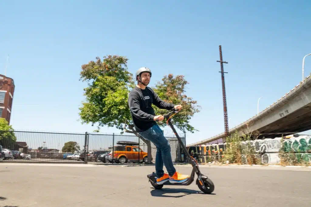 Segway-Ninebot-F2-Pro-electric-scooter-mitchell-riding
