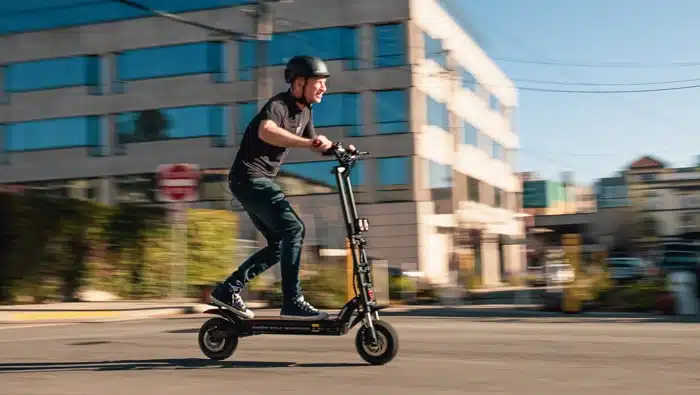 Kaabo Wolf Warrior X GT riding fast down the street