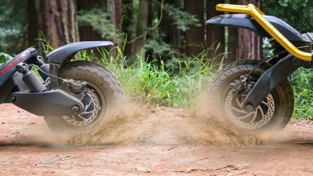 man turning on an electric scooter