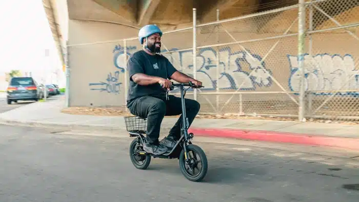 gotrax flex being ridden under bridge
