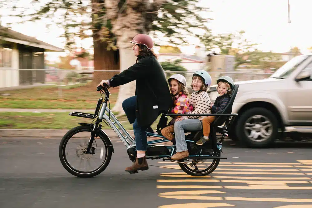 Best Electric Bikes for Parents (2026) 2 Xtracycle Swoop ASM longtail electric cargo bike for hauling kids