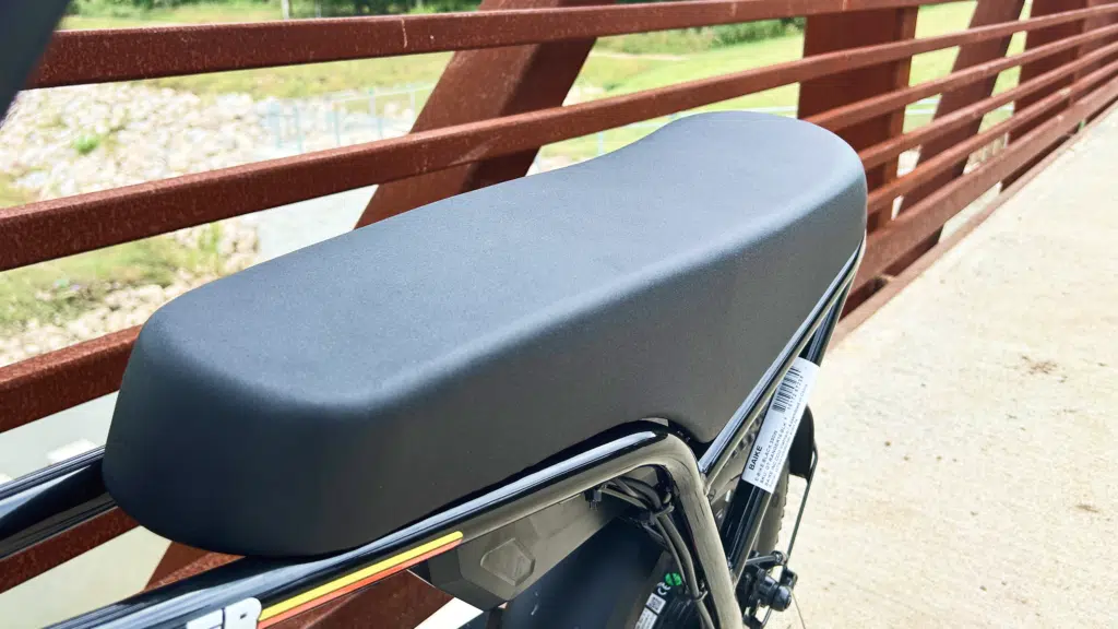Gotrax Ranger 16 Review: The $549 Mini Moped-Style Ebike That Punches Above Its Price 2 Gotrax Ranger 16 riding on gravel showing its 16 x 3 inch knobby tires