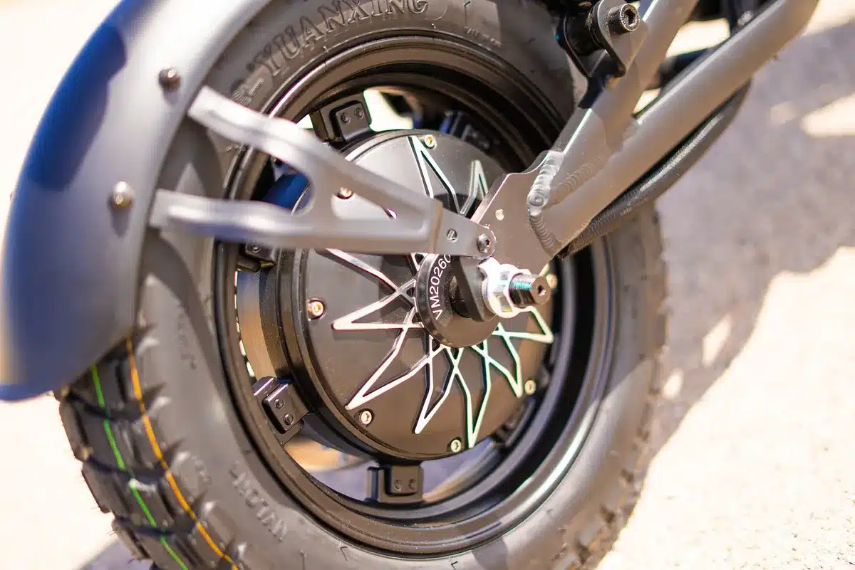 EMOVE RoadRunner Pro V2 Review: Surron Power in a Tiny, Stealthy Package 4 EMOVE RoadRunner Pro V2 rear hydraulic disc brake and 203mm rotor on the hub motor wheel