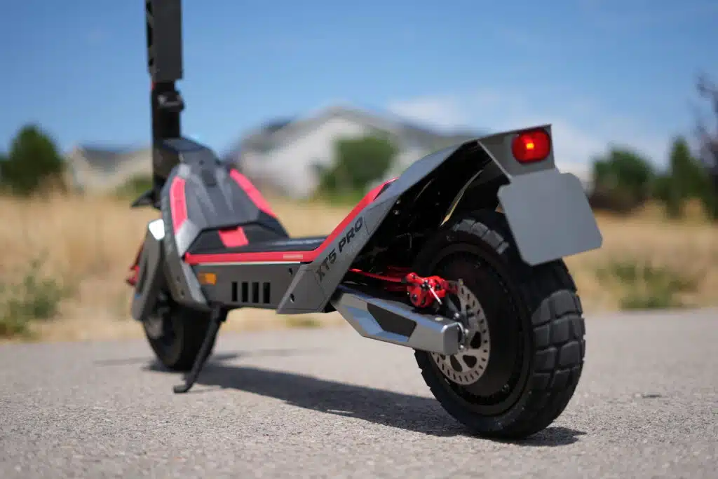 NAVEE XT5 Pro Review: A Fast, Stable 31 MPH Scooter With Serious Tech 1 Rear three-quarter view of the NAVEE XT5 Pro electric scooter