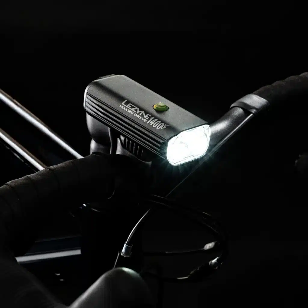 The 5 Best eBike Lights on Amazon Now That It Gets Dark at 6 4 Lezyne Macro Drive 1400+ front bike light lit up on a handlebar at night