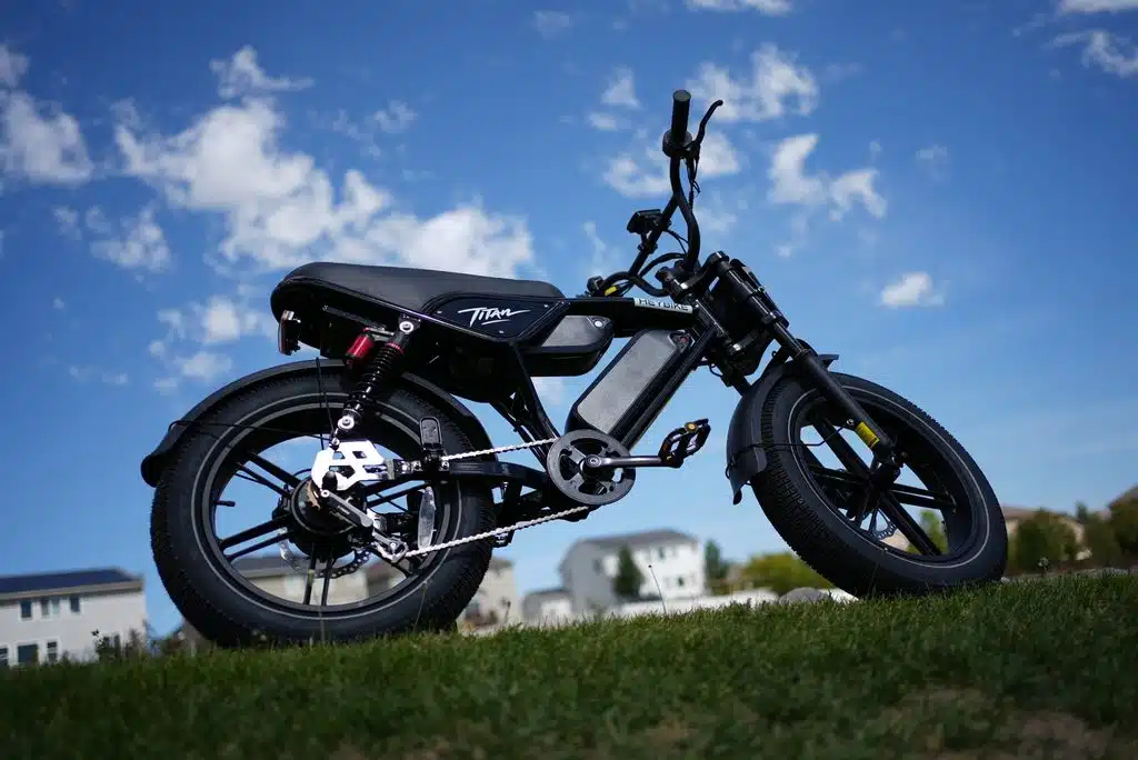 Heybike Titan Review: Street Legal, Built for Distance, and a Real Saturn Rival 4 Low angle of the Heybike Titan showing the fat tires, chain drive and battery