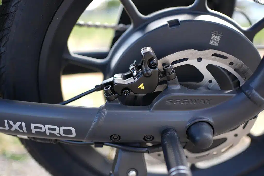Segway MUXI PRO Review: The Auto Shifter Changes Everything 4 Segway MUXI PRO rear hydraulic disc brake with 180mm rotor